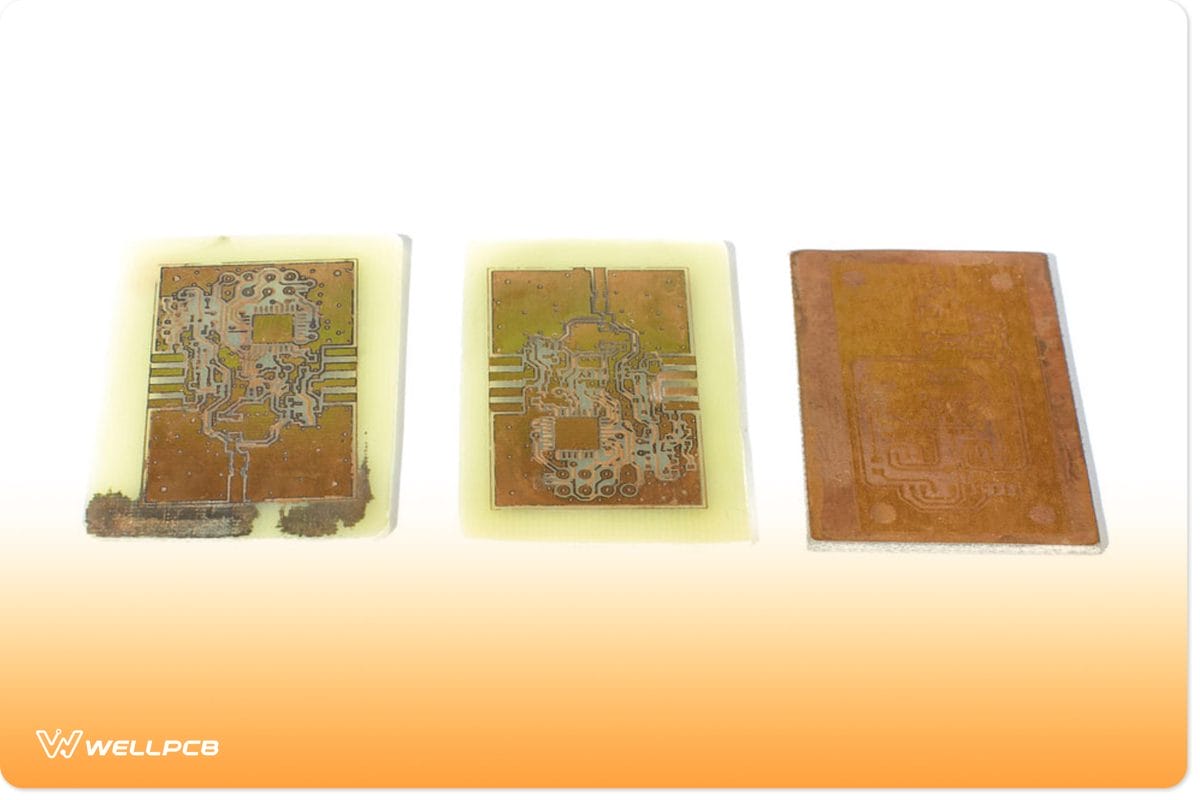 A collection of three copper-printed circuit boards.