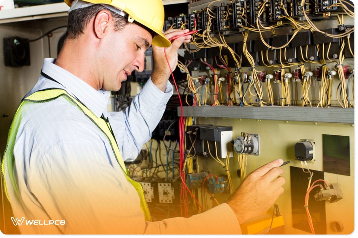 An Electrician Testing An Industrial MachineÂ