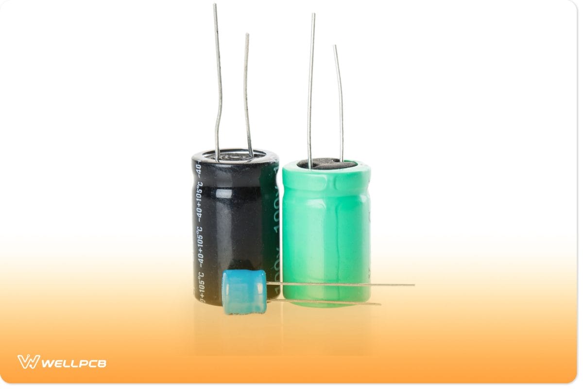Image of three capacitors with different sizes and colors